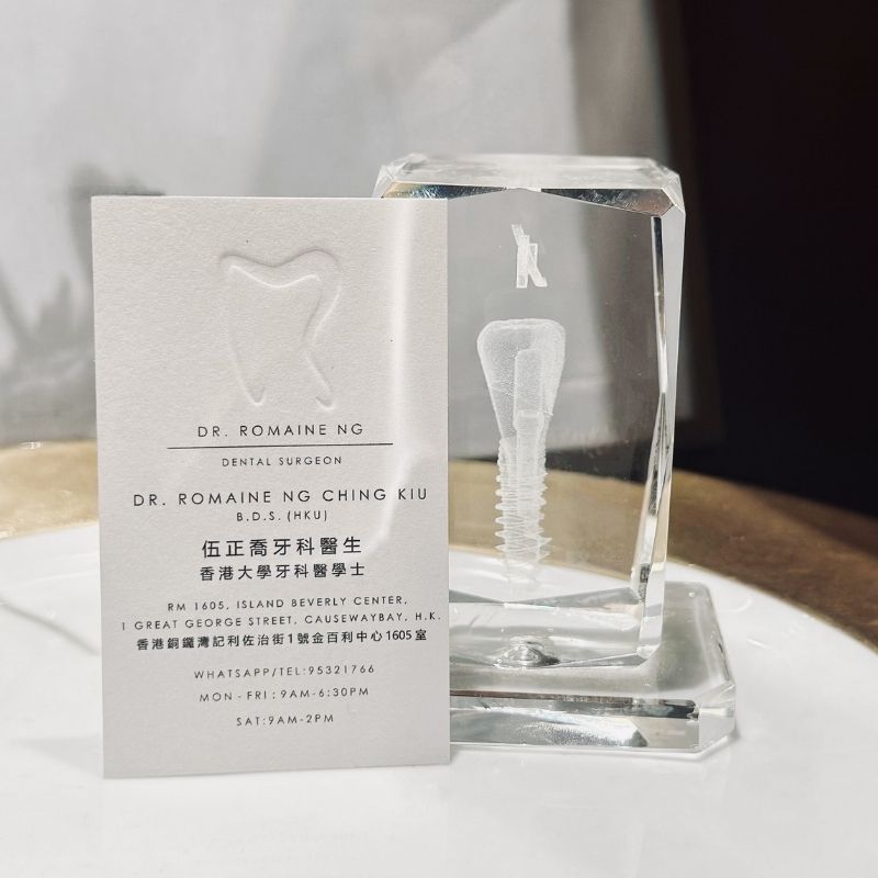 dr-romaine-dental-clinic-business-card